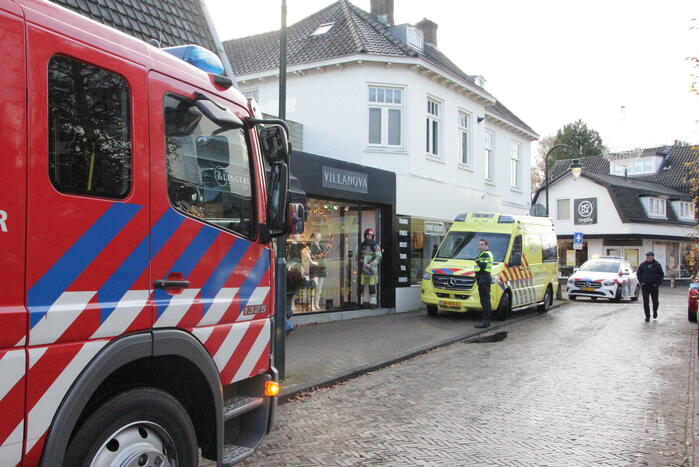 Kledingwinkel ontruimd, medewerker onwel