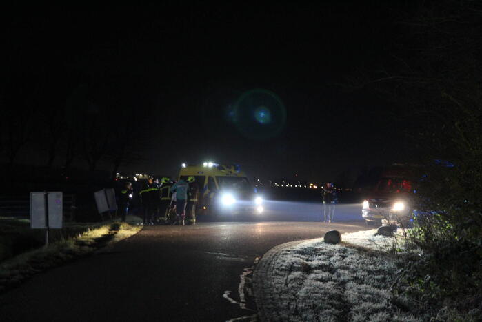 Persoon op scootmobiel raakt te water