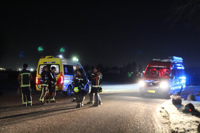 Persoon op scootmobiel raakt te water