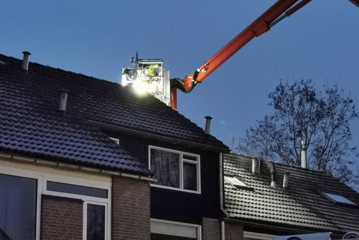 Brand in schoorsteen van woning