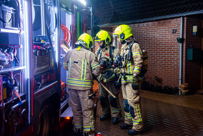 Buurman ontdekt brand in woning van buren