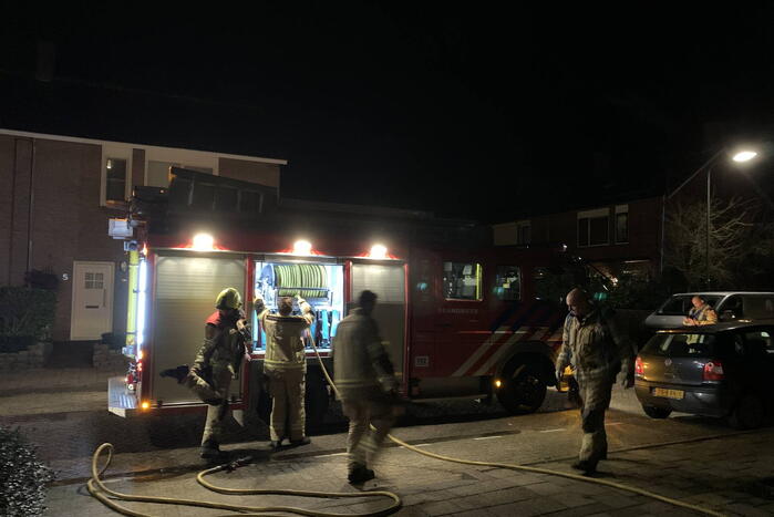 Container uitgebrand achter schuren