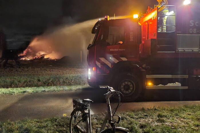 Stapel hout in brand