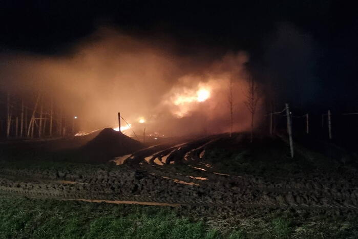 Stapel hout in brand