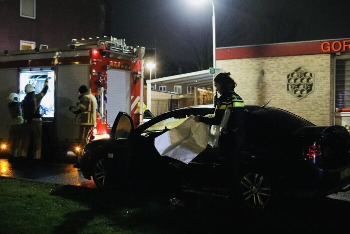 Brand in achterbak van personenauto