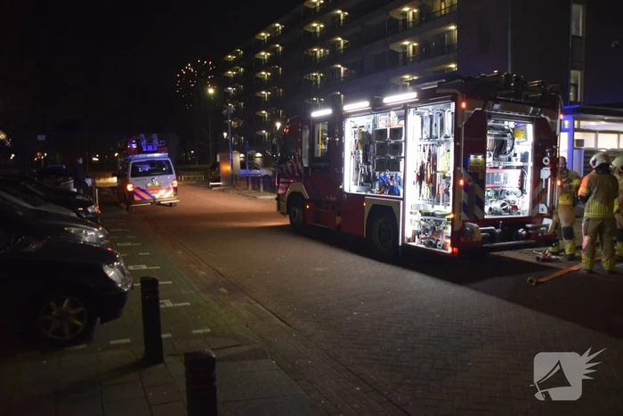 Brand op balkon door vuurwerk