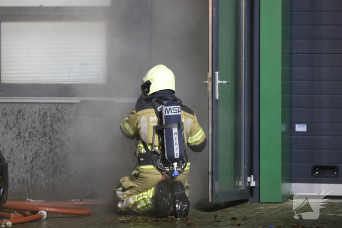 Uitslaande brand in bedrijfspand