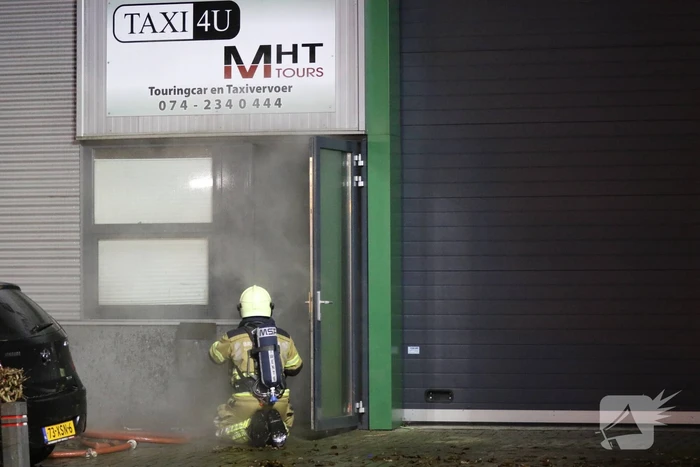 Uitslaande brand in bedrijfspand