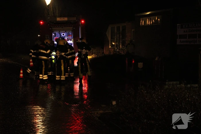 Veel rook door brand in container