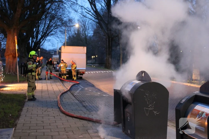 Ondergrondse container in brand