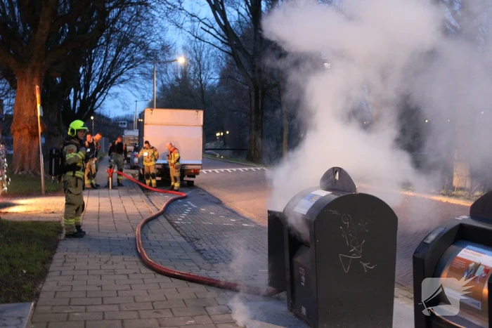 Ondergrondse container in brand
