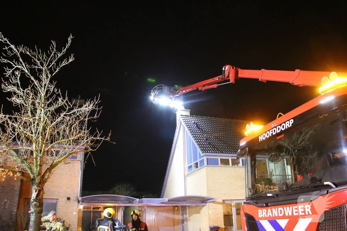 Brand in schoorsteen van woning