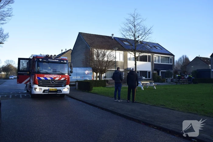 Gordijnen vatten vlam in woning