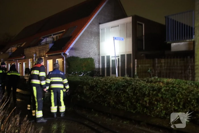 Brand in portiek woning