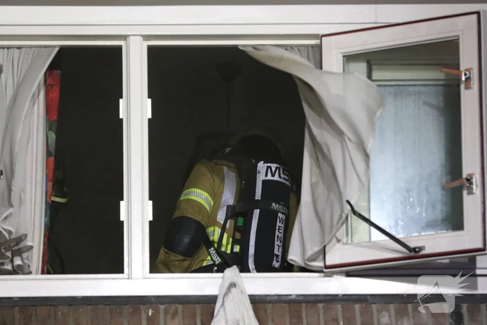 Veel rook bij woningbrand