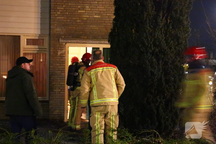 Pan vat vlam, bewoner gewond