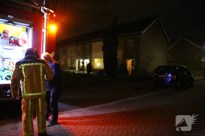Pan vat vlam, bewoner gewond