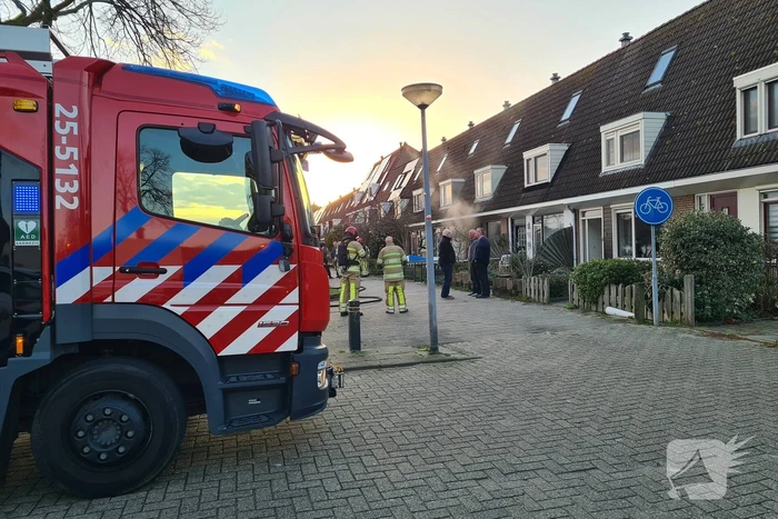 Flinke rookontwikkeling bij fauteuil in brand