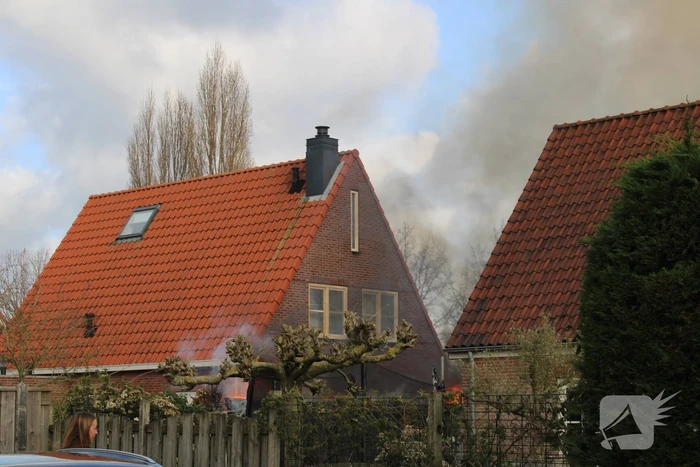 Tuinhuis vat vlam