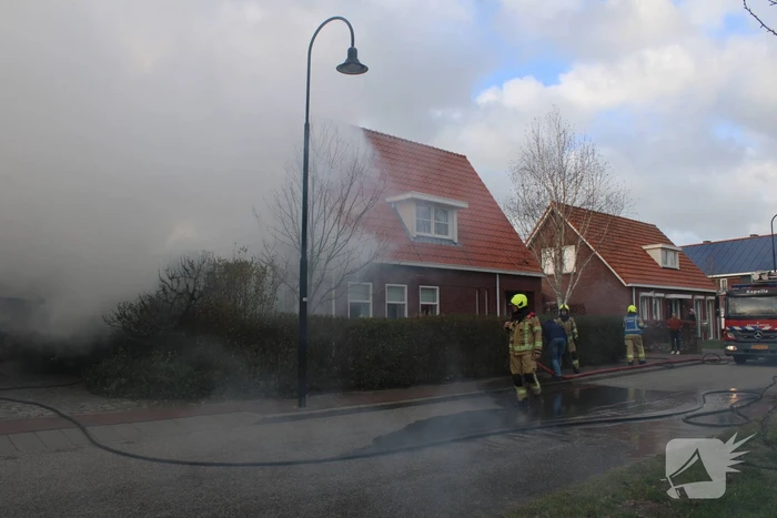 Tuinhuis vat vlam