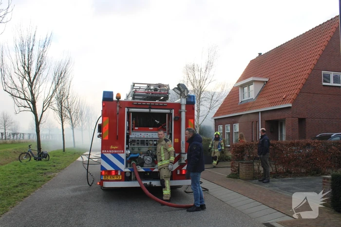 Tuinhuis vat vlam