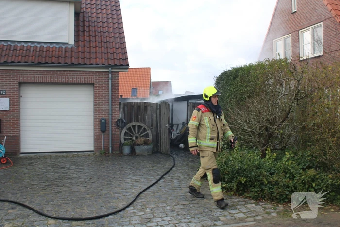 Tuinhuis vat vlam
