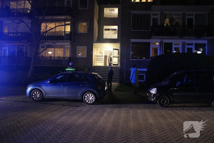 Bankstel in brand in flatwoning