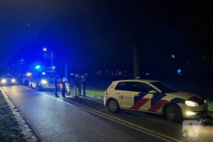 Twee personen ten val met motor