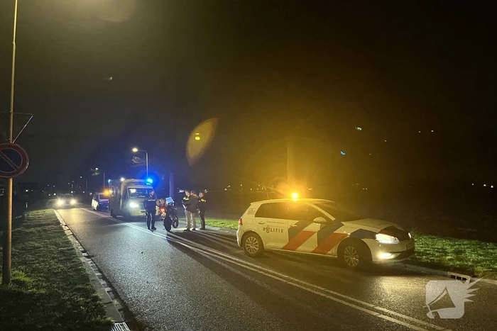 Twee personen ten val met motor