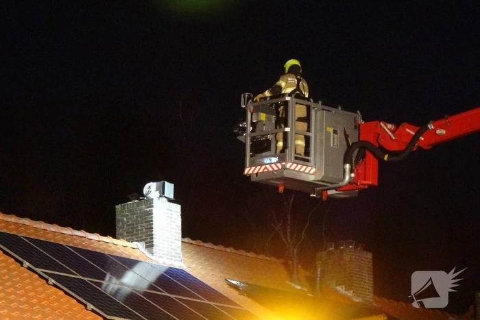Schoorsteen geveegd na brand