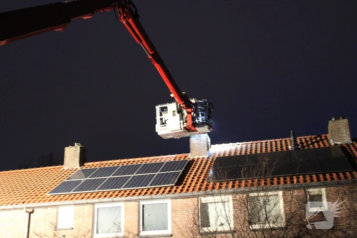 Schoorsteen geveegd na brand