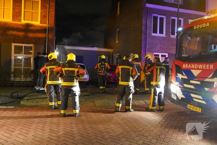 Brand in een schuur naast de woning