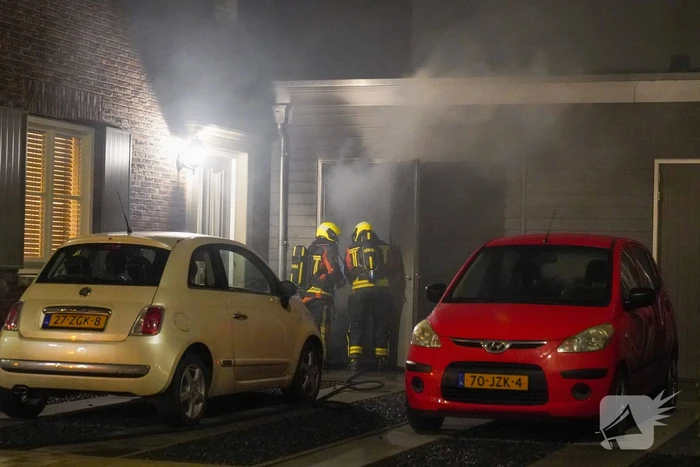 Brand in een schuur naast de woning