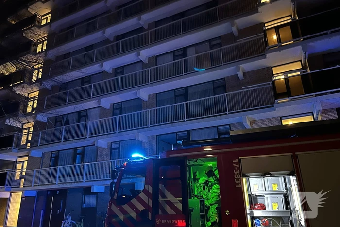 Brand in keuken van flatwoning