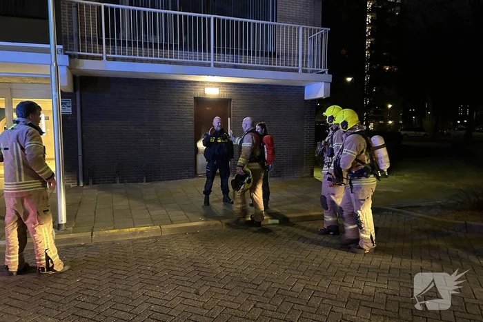 Brand in keuken van flatwoning
