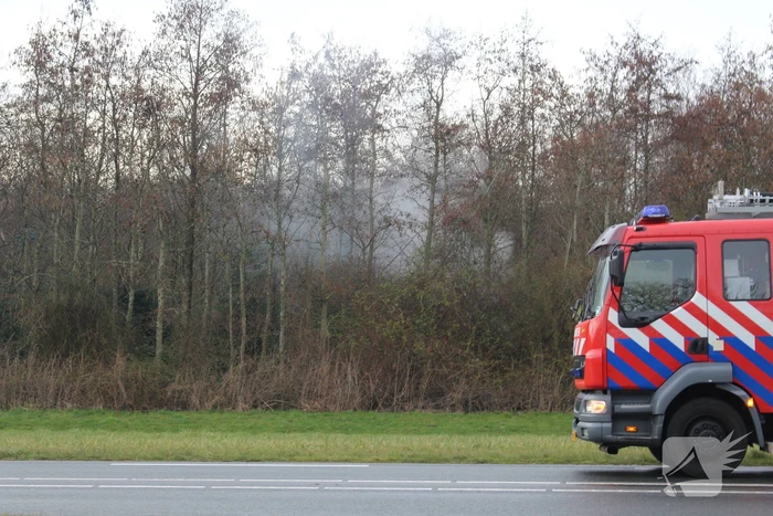 Brand in bosschage door koperverbranding