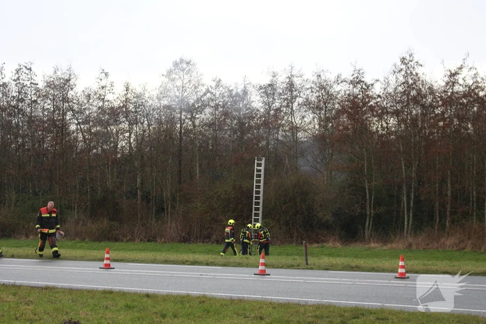 Brand in bosschage door koperverbranding