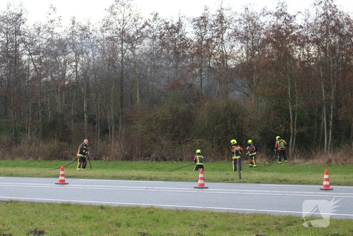 Brand in bosschage door koperverbranding