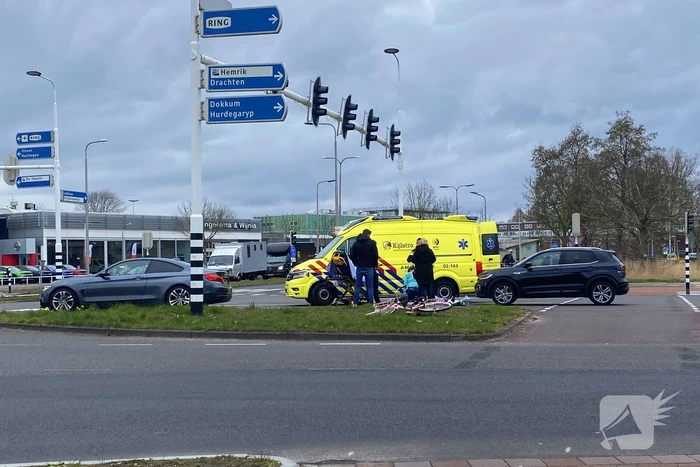 Fiets in de kreukels na negeren rood verkeerslicht