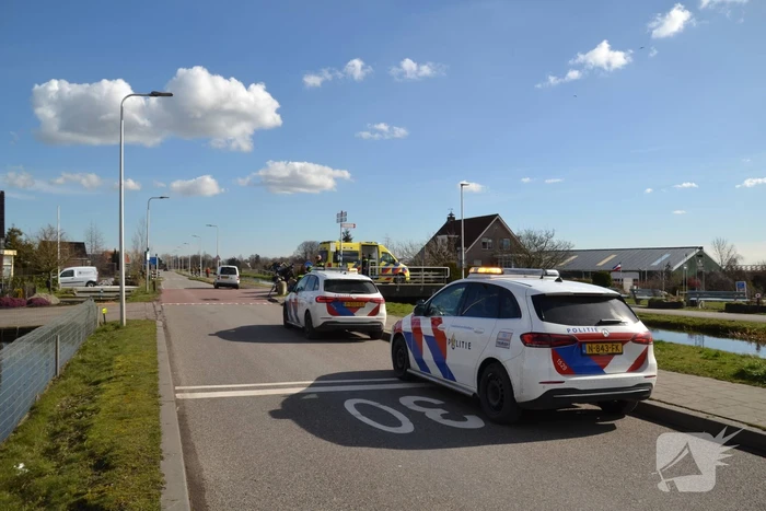 Fietser geschept door bestelbus