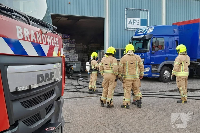 Brand in magazijn van bedrijfspand