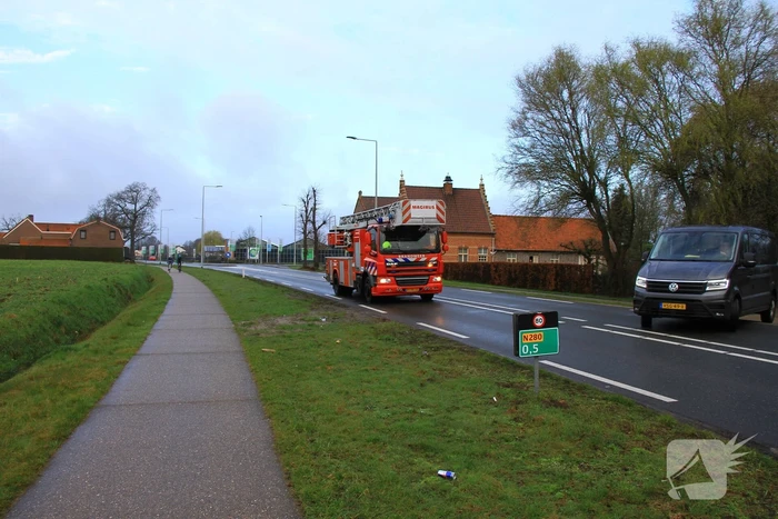 Kraai vast in schoorsteen van woning