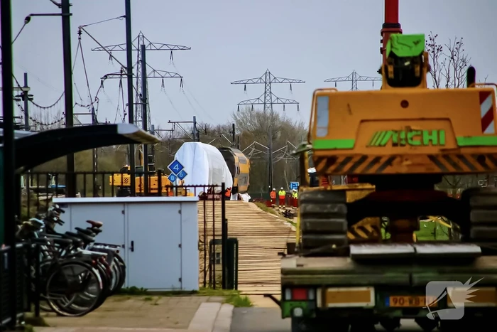 Bedrijven druk bezig berging treinstellen