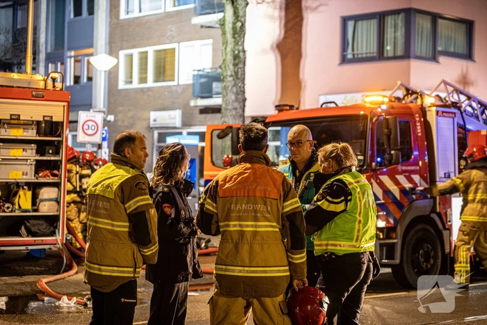 Gezin uit woning gered door brandweer