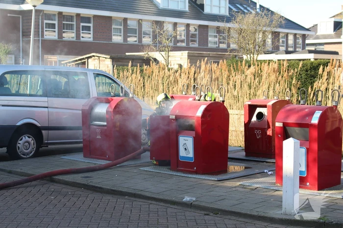 Brand in ondergrondse papiercontainer