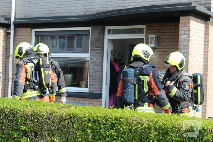 Verbrande hamburgers zetten woning vol rook