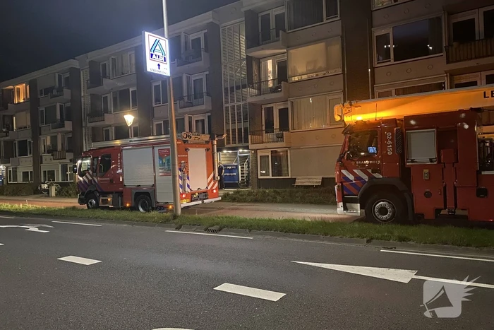 Brand in portiek woning snel geblust