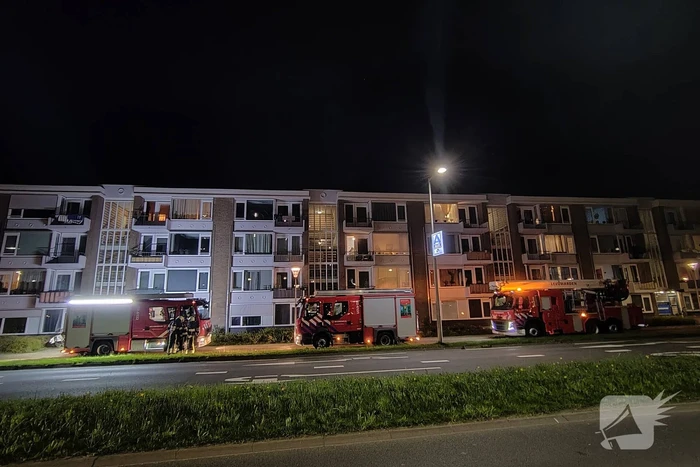 Brand in portiek woning snel geblust