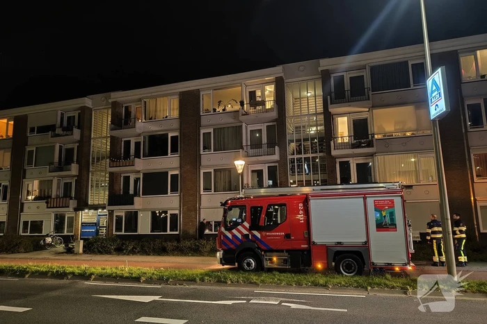 Brand in portiek woning snel geblust