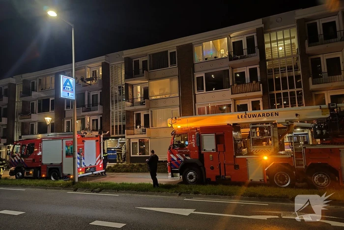 Brand in portiek woning snel geblust